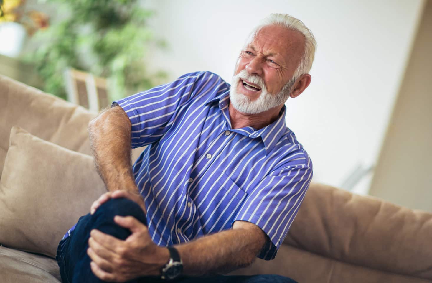 Older man with knee pain.